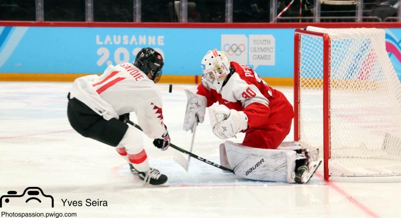 Photo hockey Jeux olympiques -  : Danemark (DEN) vs Canada (CAN) - Survol de la Feuille d