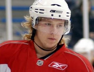 Photo hockey NHl: Backstrom prend la monnaie - NHL : National Hockey League - AHL