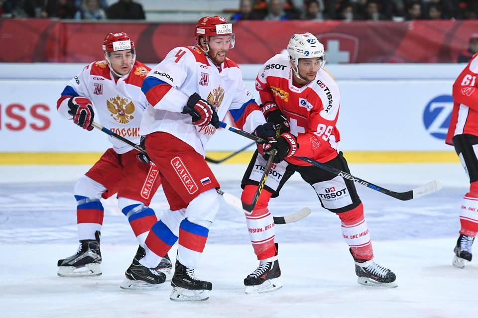 Photo hockey match Switzerland - Russia