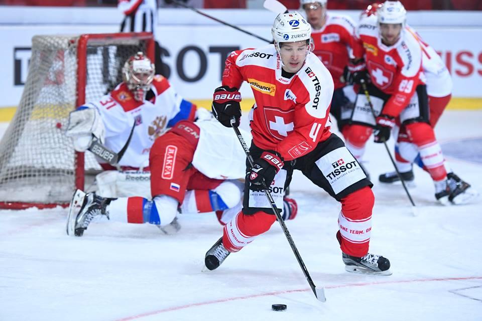 Photo hockey match Switzerland - Russia