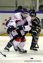 Photo hockey reportage Les Ducs survolent la rencontre 