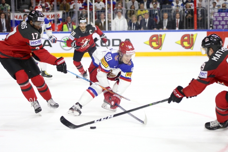 Photo hockey Championnats du monde -  : Canada (CAN) vs Russie (RUS) - Le Canada se sort du piège Russe.