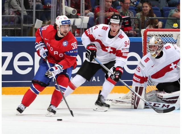 Photo hockey Championnats du monde -  : Norvège (NOR) vs Suisse (SUI) - Sauce Fischer contre sauce Johansen