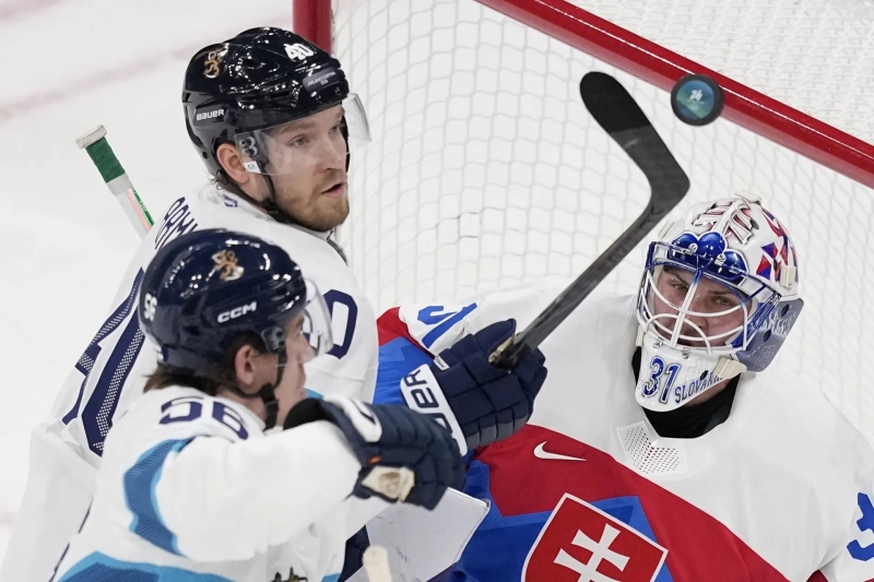 Photo hockey Jeux olympiques -  : Slovaquie (SVK) vs Finlande (FIN) - Le champion olympique pris dans le piège slovaque