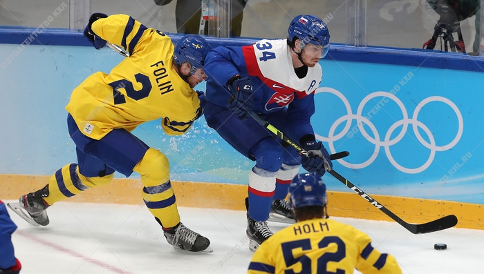 Photo hockey Jeux olympiques -  : Suède (SWE) vs Slovaquie (SVK) - Les Slovaques historiquement bronzés