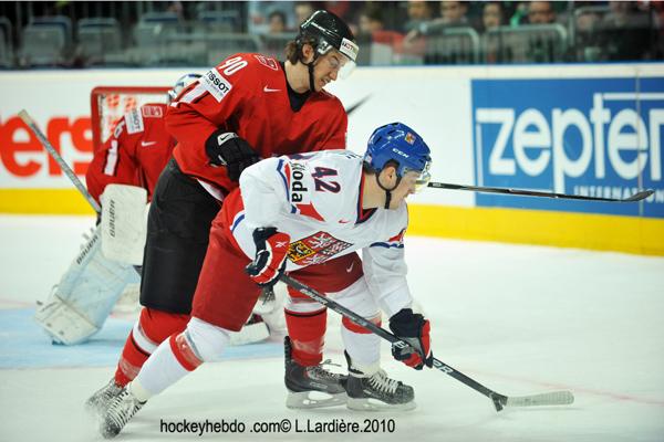 Hockey mondial 10: La Suisse invaincue — Reportage