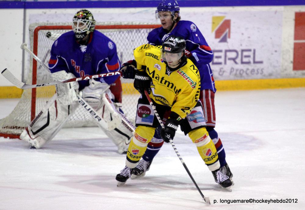 Les Dragons chutent mais espèrent. — Reportage