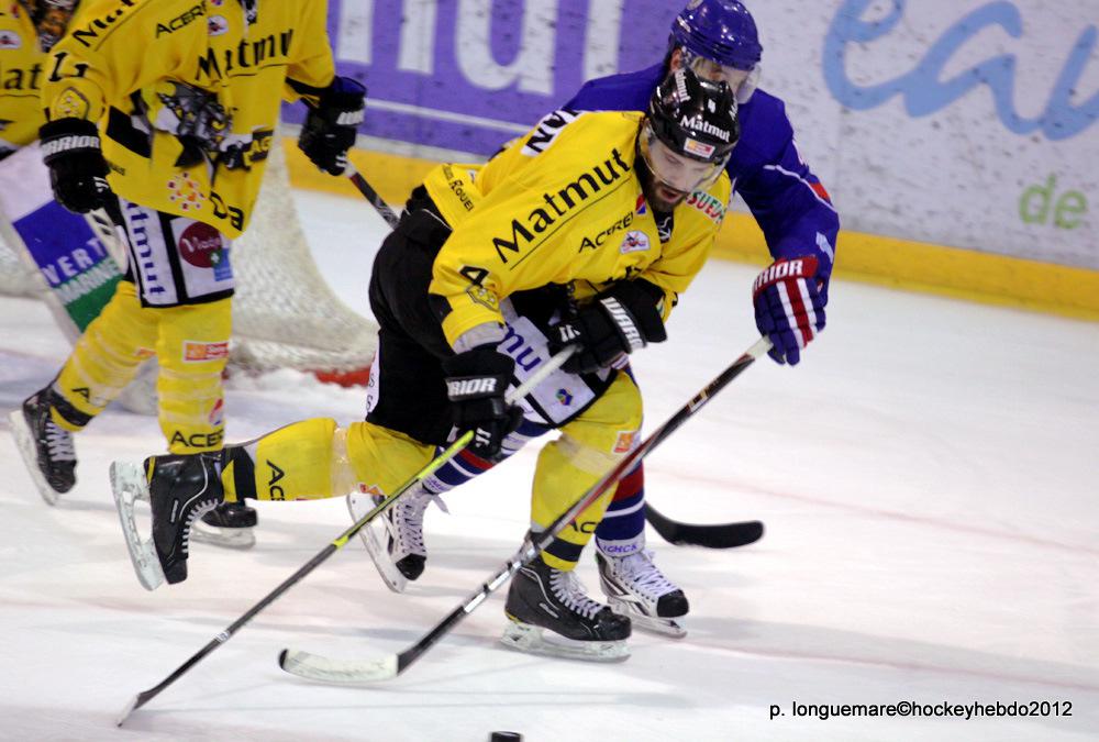 Les Dragons chutent mais espèrent. — Reportage