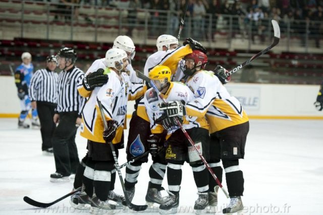 Photo hockey reportage Sous le signe du 3