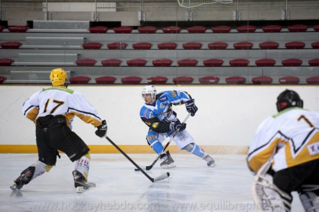 Photo hockey reportage Sous le signe du 3