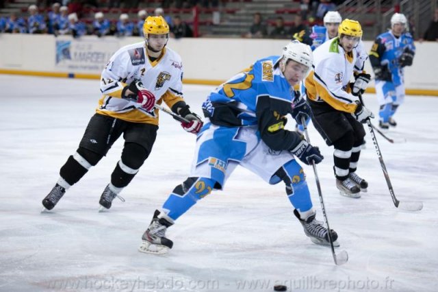 Photo hockey reportage Sous le signe du 3