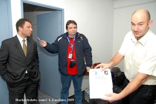 Photo hockey Arbitrer à deux, c