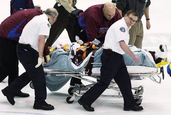 Photo hockey Le problème des KO en direct - NHL : National Hockey League - AHL